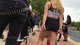 0015 raver girl booty shorts cheeks camera caught public festival blonde