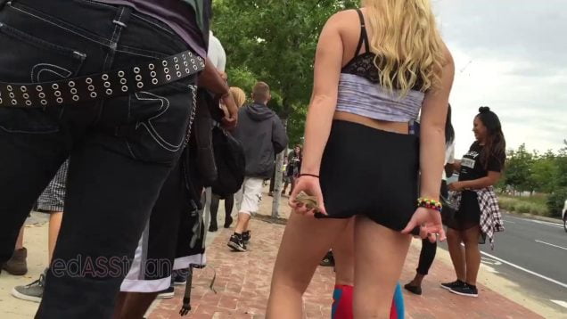 0015 raver girl booty shorts cheeks camera caught public festival blonde