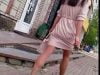 Public voyeur video of a girl with well toned legs wearing short dress
